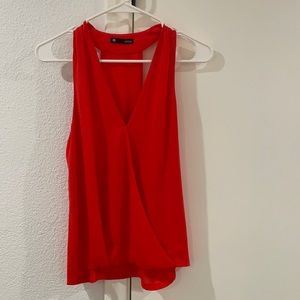 Coral/red top great for a night out.